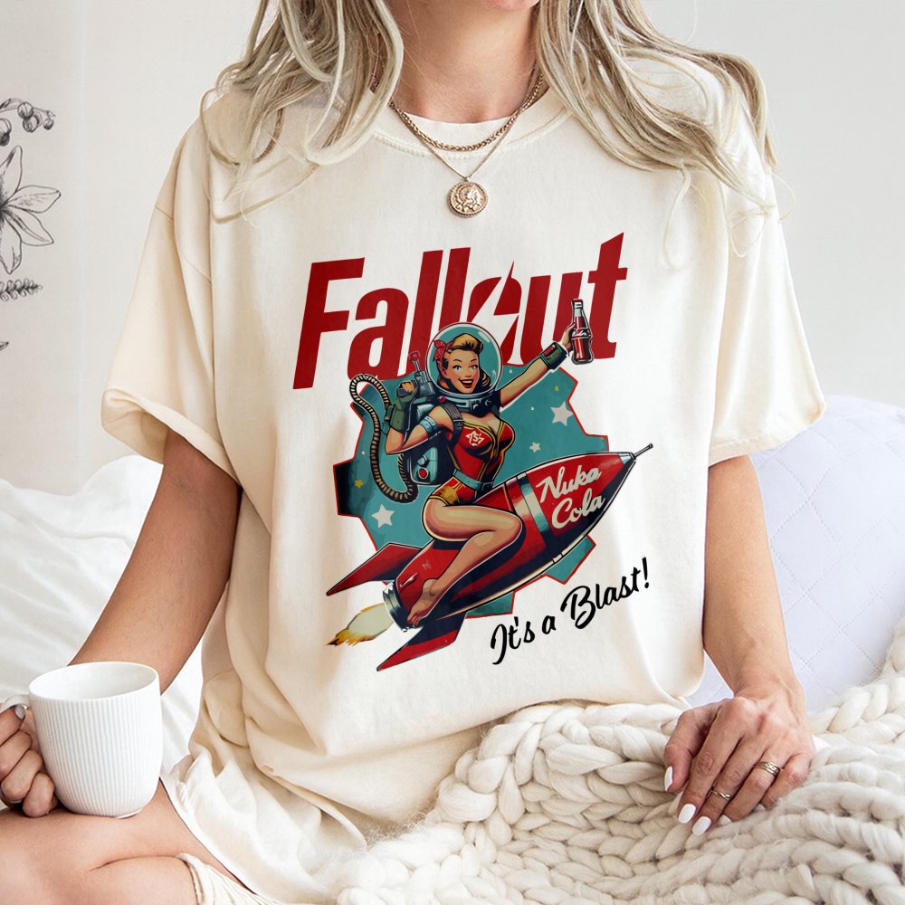 Retro Gaming T-Shirt | Nuka Cola Pin-Up Girl Graphic Tee | Premium 100% Cotton Apparel | Unique Gift for Fallout Fans