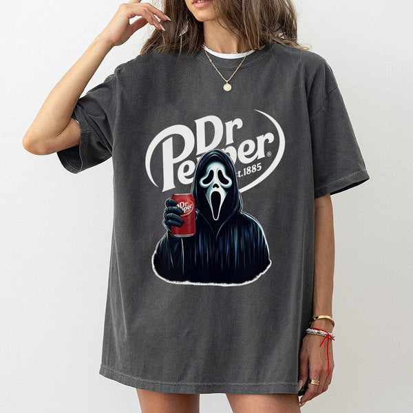 Horror Movie Ghost Graphic T-Shirt | Scary Slasher Drinking Soda Design | Premium Soft Cotton Tee | Unisex Halloween Gift for