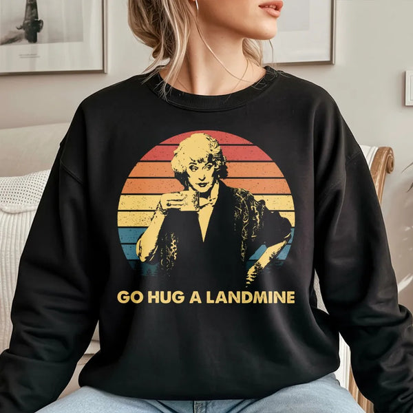 Go Hug A Landmine Sweatshirt | Sarcastic Retro 80s TV Character Graphic | Premium Cotton Blend | Funny Gift For 90s Sitcom Fa